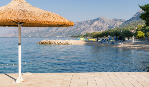 View of the beautiful beach in Brela in front of the family villa for vacation and rental Brela Pride with swimming pool and private parking for ten people