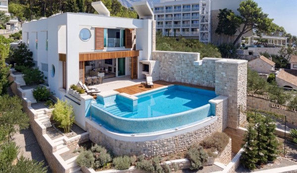 Luxury fenced villa Brela Pride in Brela for rent and vacation by the sea and pebble beach with private heated pool, outdoor kitchen with grill, Internet and private parking