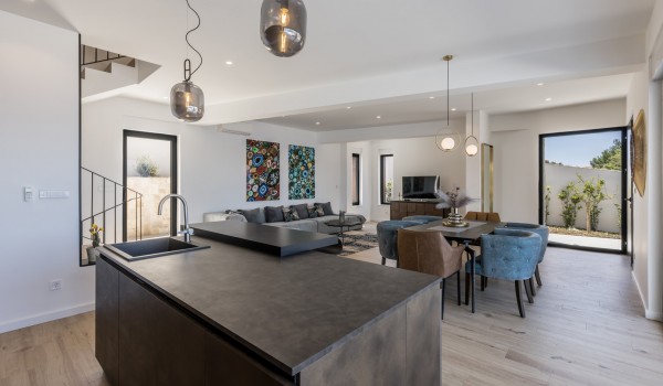 Fully equipped kitchen area of Croatia luxury pool villa with dining table for vacation and rent