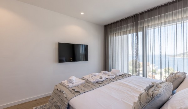 Bedroom of Croatia luxury holiday villa Razanj Seven Seas with king-size bed and SMART TV for rent