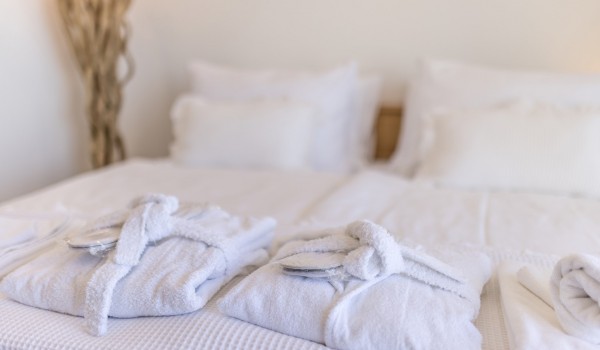 Bedroom of Croatia luxury villa Seven Seas with king-size bed and towels for vacation and rent