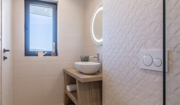 Bathroom of Croatia luxury pool villa with sink and mirror for vacation and rent with friends and family