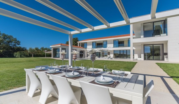 Outdoor dining table in the garden of a Croatia luxury pet-friendly villa Eden Land with total privacy in Istria