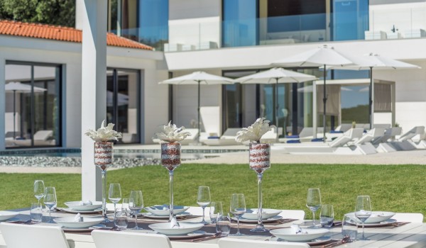 Outdoor dining table in the garden of a Croatia luxury pet-friendly villa Eden Land with total privacy in Istria