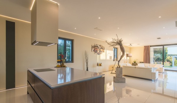 Fully equipped kitchen with kitchen island in a Croatia luxury seafront villa for vacation and rent in Istria