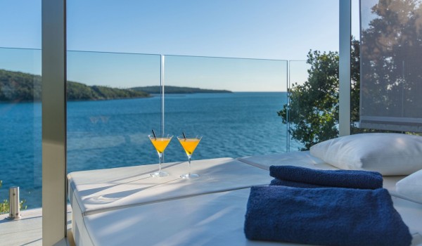 Sun bed with sea view on the terrace of a Croatia luxury pet-friendly villa for vacation and rent in Istria