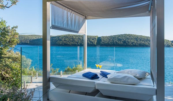 Sun bed with sea view on the terrace of a Croatia luxury pet-friendly villa for vacation and rent in Istria