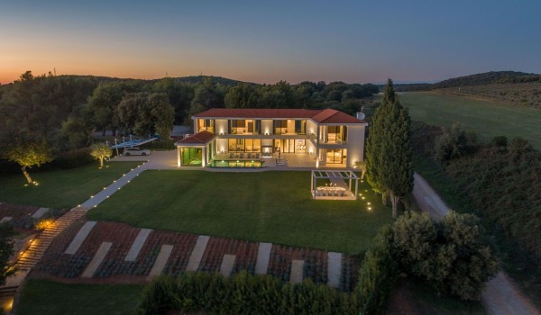 Night view of a Croatia luxury seafront villa with private parking and sauna in Istria