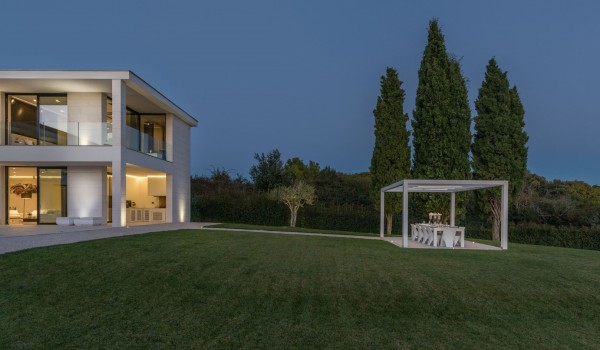 Night view of a Croatia luxury seafront villa with private parking and sauna in Istria