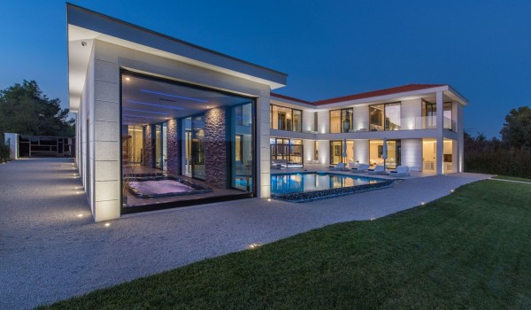 Night view of a Croatia luxury seafront villa with private parking and sauna in Istria