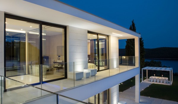 Night view of a Croatia luxury seafront villa with private parking and sauna in Istria