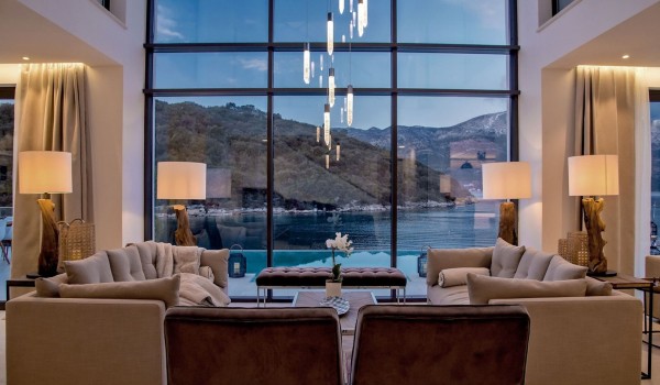 Living room with sofa and armchairs in the luxury villa Korcula Prestige with a view of the sea on the island of Korcula