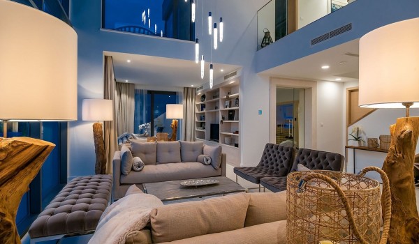 Living room with sofa, armchairs and stool in the luxury villa Korcula Prestige on the island of Korcula