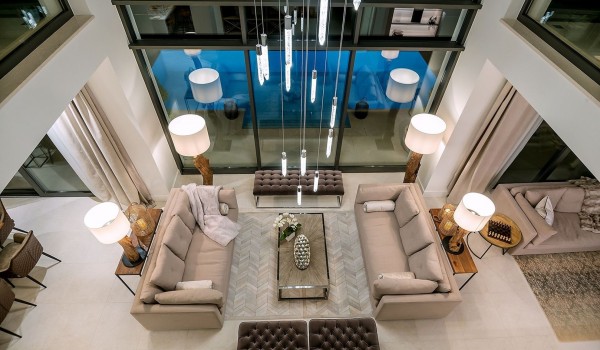 View of the living room with sofa, armchairs and stool in the luxury villa Korcula Prestige with private pool on the island of Korcula