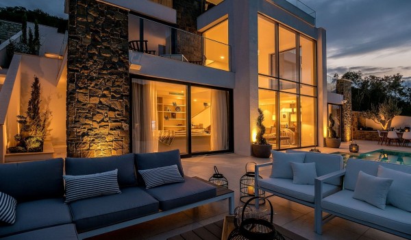 Lounge chairs by the private pool on the outdoor terrace of the luxury villa Korcula Prestige on the island of Korčula
