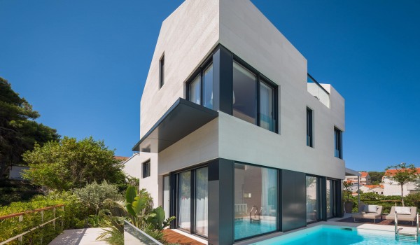 Croatian luxury villa by the beach for family vacation and rent with private heated pool.