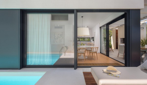 Sunbathing area by the private pool on terrace of Sutivan Croatia luxury villa for vacation and rent by the sea.