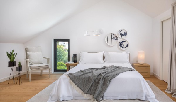 Airy bedroom with Queen-size bed in family luxury holiday villa Sutivan by the sea with private pool.