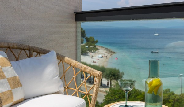 Terrace by the sea with outdoor furniture in Sutivan luxury villa for vacation and rent with private pool.
