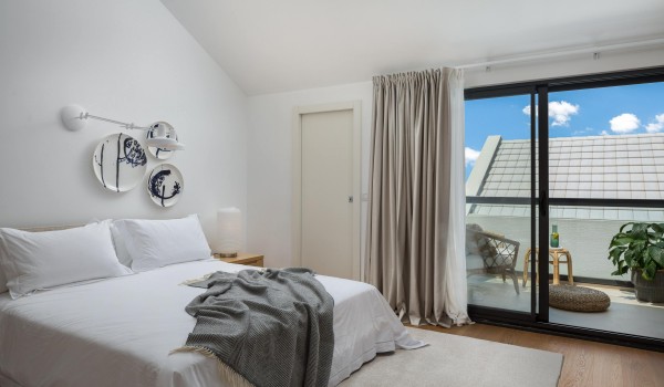 Airy bedroom with King-size bed in Croatian family luxury villa Sutivan by the sea with private pool.