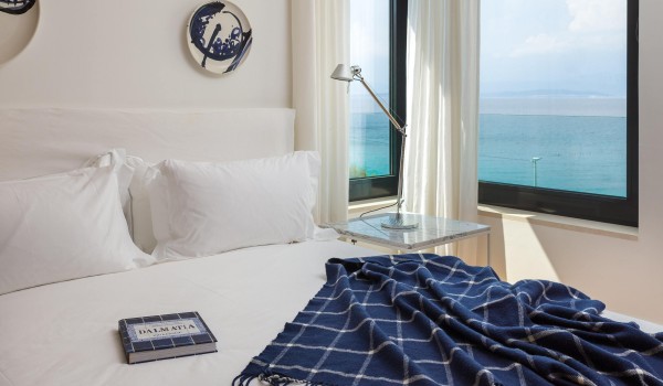 Modern bedroom with en suite bathroom in Croatia private luxury villa with private pool by the beach.