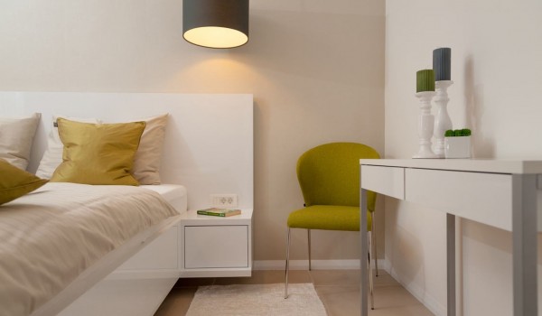 King-size bed in the bedroom of a Croatia luxury family villa for vacation and rent in Trogir