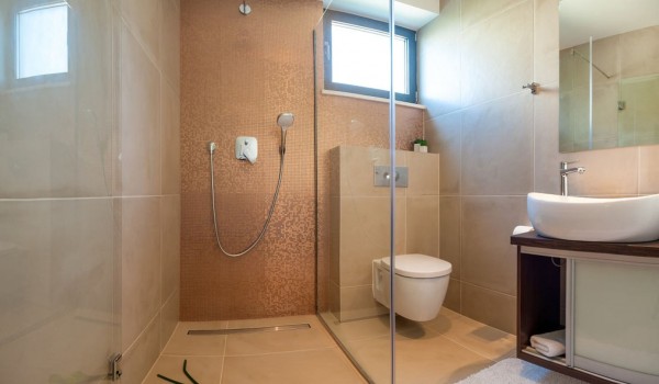 Walk-in shower in the en suite bathroom of a Croatia  luxury villa with pool and sea view on Ciovo