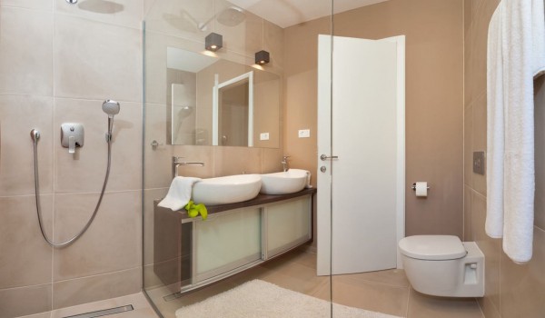 Walk-in shower in the en suite bathroom of a Croatia  luxury villa with pool and sea view on Ciovo