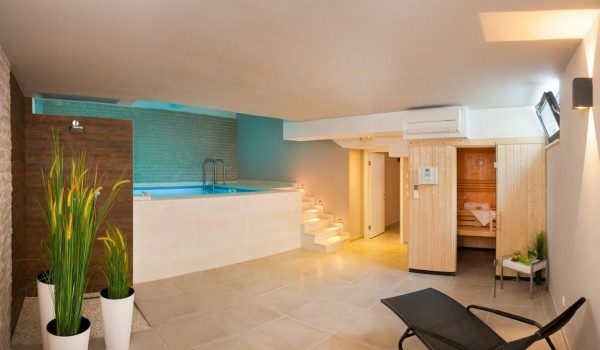 Sun loungers by the indoor heated pool in a Croatia luxury villa with private parking and sea view