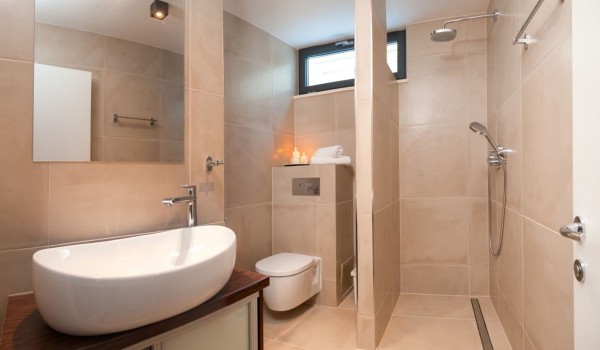 Modern bathroom with walk-in shower in a Croatia luxury family villa Trogr 2 with private pool and sauna on Ciovo