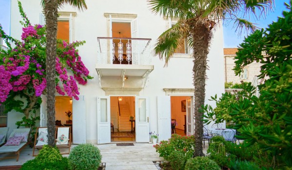 View of the courtyard and the entrance to the Croatian luxury family rental villa Beach House Orebic on Peljesac