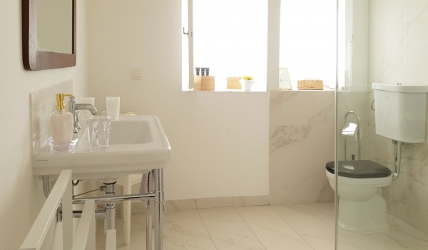 Washbasin and walk in shower cabin in the bathroom of the family villa Beach House Orebic on Peljesac