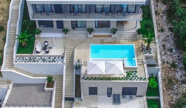 Aerial view of a luxury holiday Dubrovnik villa with private pool near the sea with total privacy