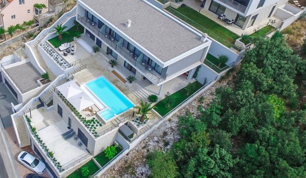 Aerial view of a luxury Dubrovnik family villa with private  pool near the sea with total privacy