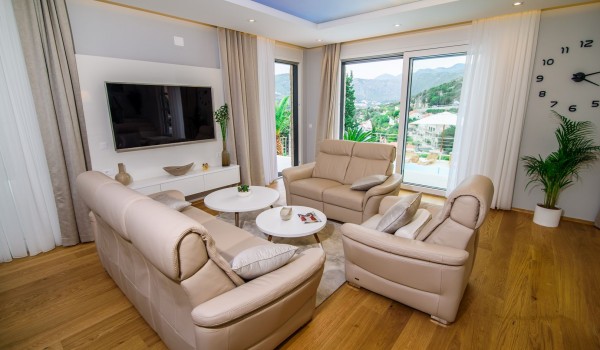 Living room with comfortable sofas in a luxury Dubrovnik villa with private parking and wifi