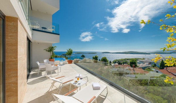 Lounge area on the terrace of the luxurious villa Hvar Fantasy with the sea view and the private heated pool in the town of Hvar