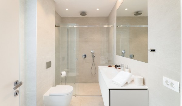 Inside of the luxury bathroom of villa Hvar Fantasy with the shower cabin and sink with mirror designed for vacation and rent