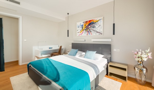 Bedroom of the luxury villa Hvar Fantasy with the reading corner and the king size bed for vacation and rent