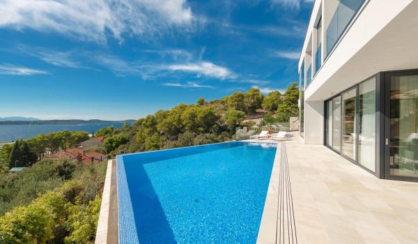 Day view of the private terrace with pool overlooking the blue sea in the holiday family villa Hvar Fantasy in the town of Hvar