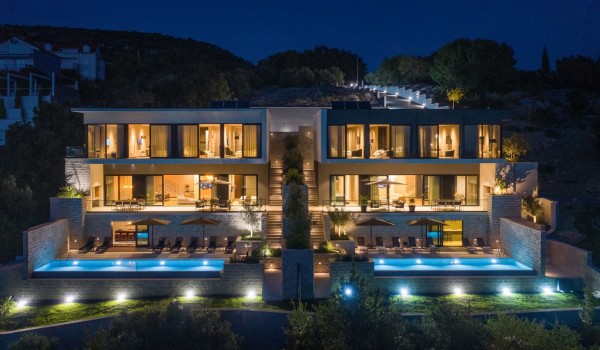 Aerial night view of Croatia luxury family villa Elena with private parking and pool on the terrace