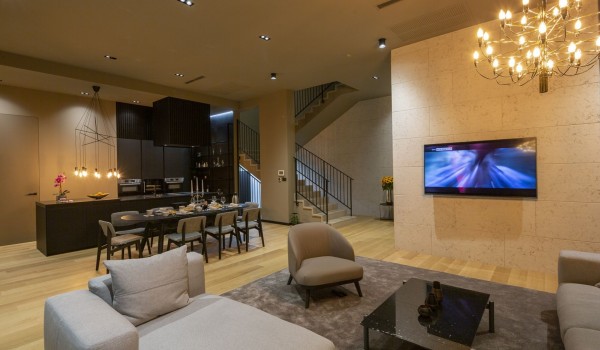 Living room area of Croatia luxury seafront villa with SMART TV and sofas for vacation and rent