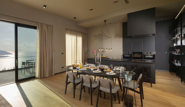 Fully equipped kitchen area of Croatia luxury pool villa with oven and microwave for family vacation