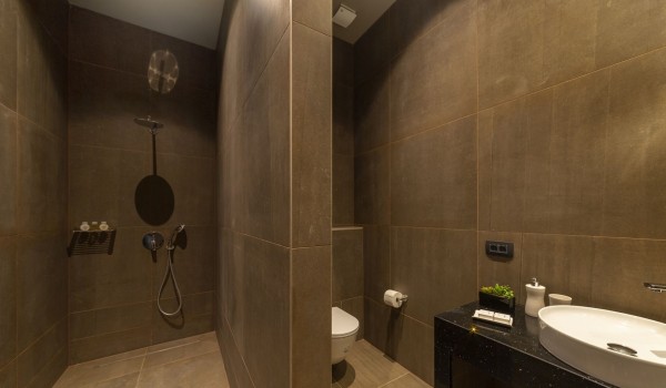 Bathroom of Croatia luxury pool villa with shower cabin and sink with mirror for family vacation
