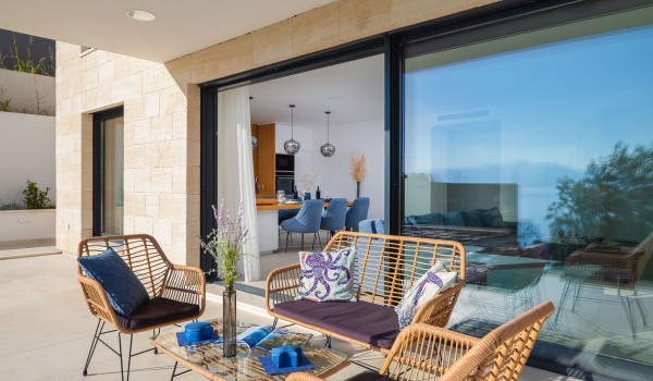 Terrace with outdoor furniture near pooll in Makarska  luxury pet-friendly villa for vacation and rent.