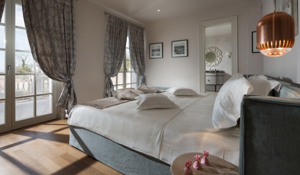 Comfortable double bed in the bedroom in the Croatian luxury pool villa Lea in Vabriga in Istria