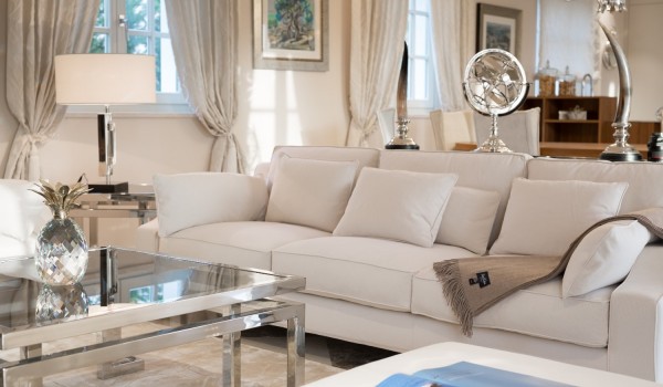 Comfortable white sofa and coffee table in the living room in the luxury villa Lea in Vabriga in Istria with total privacy