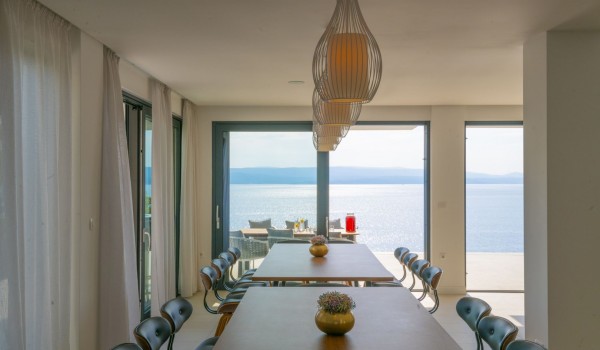 Dining table with chairs and sea view in the luxury villa with private pool Glorious Brela in Brela with total privacy