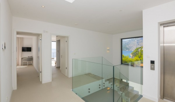 A view of the stairs leading to the ground floor of the luxury villa for rent and vacation Glorious Brela in Brela