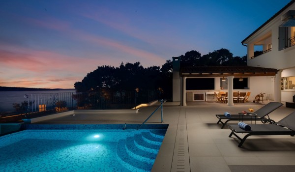 Private pool and sun loungers on the terrace of the Croatia luxury family villa by the beach