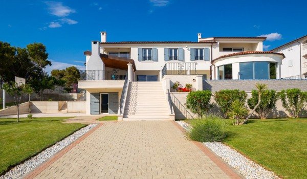 Paved road to the Croatia luxury family villa for vacation by the sea in Sibenik